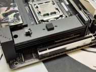 The X870-I stacks one SSD atop another, given its limited space (Image via Sportskeeda)